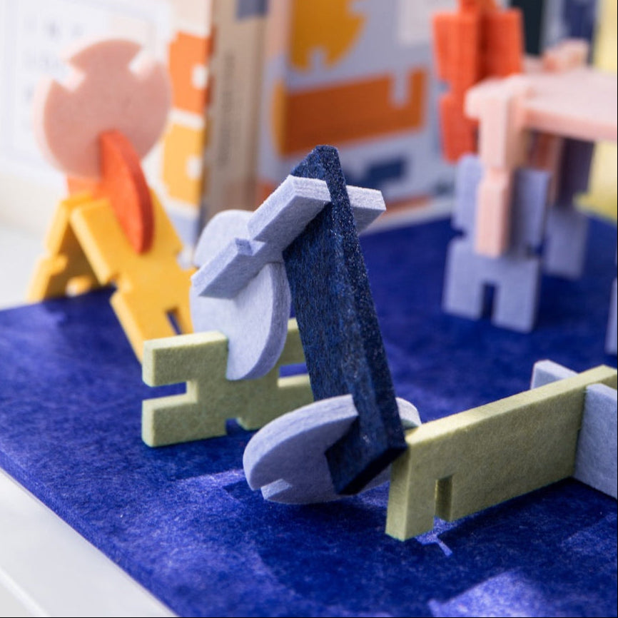 colorful blocks in assorted shapes are built into bicycles and jumps.