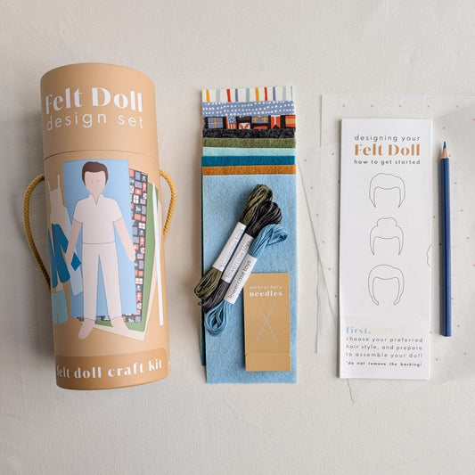 Paper Doll fashion craft kit; This Cape version features a boy doll with masculine clothing patterns